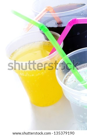 assorted carbonated drinks on white background