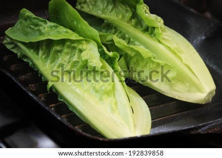 grilled seared fried roamine lettuce heart