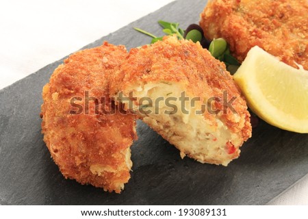 crab fish cakes on slate platter