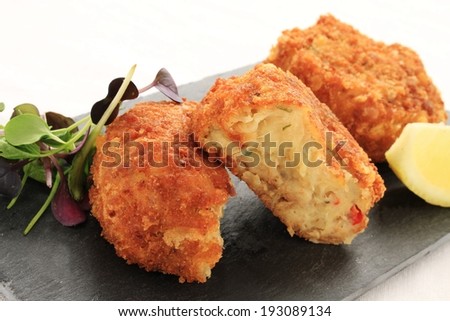 crab fish cakes on slate platter