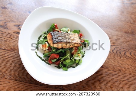 pan seared salmon steak with bean salad meal