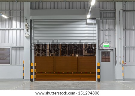 Shutter Door Inside Factory, Night Scene.