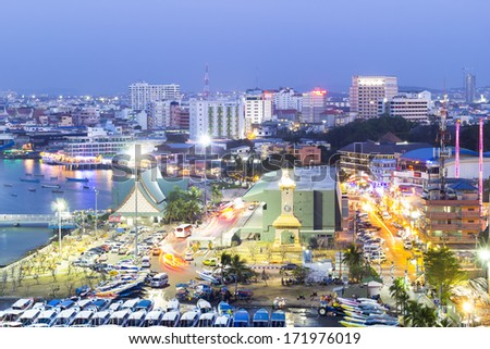 Pattaya - Holiday Nights : Pattaya City twilight time, busy with cars and people on January 18th, 2014