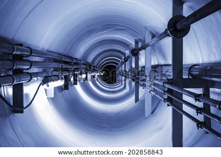 Underground tunnel connecting the pipes from the old plant to the new plant for transport gas and electrical line.