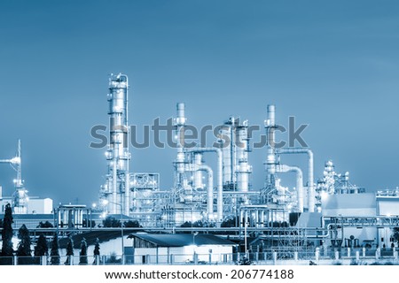 Distillation tank of oil refinery, blue color tone.