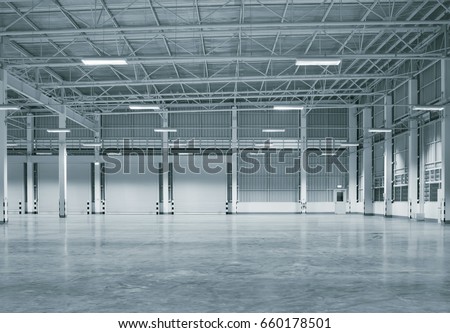 Factory building or warehouse building with concrete floor for industry background.