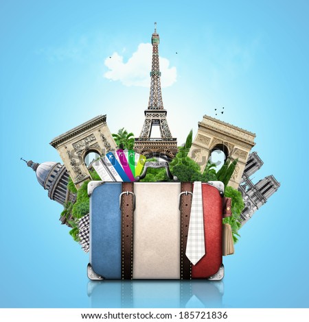 France and attractions of Paris, retro suitcase, travel