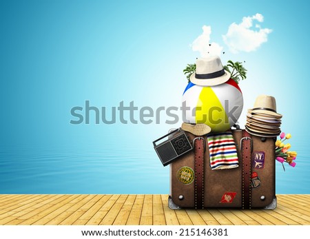 Travel, retro suitcase with travel hats on the sea