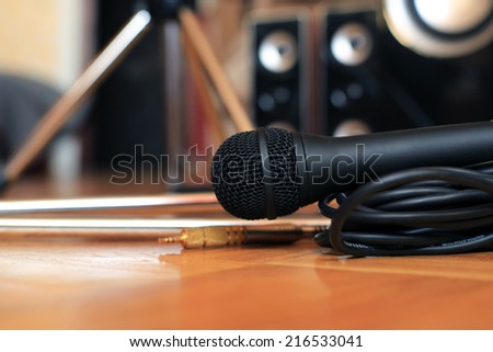 Music microphone wire on the background of the audio system