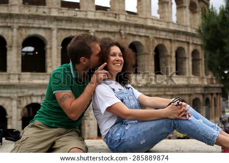 Tourists on the background of Colosseum, Roman holiday