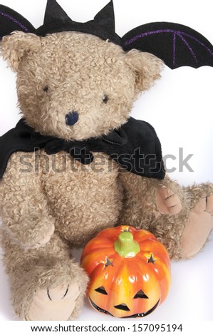 Halloween teddy bear dressed as the devil, isolated on white background