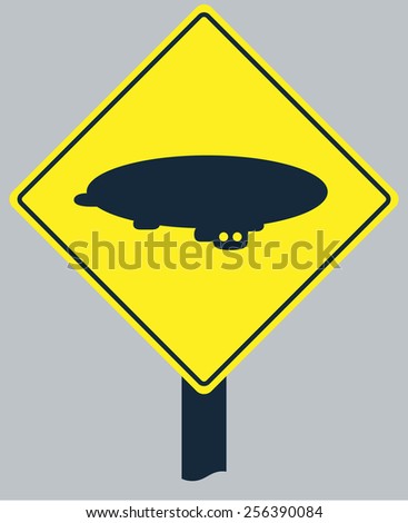 Yellow sign with zeppelin silhouette, for air transportation design
