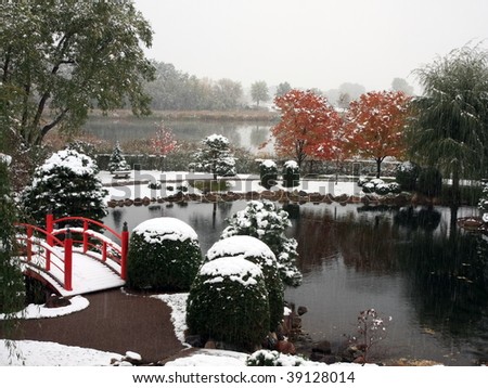 Pond in Japanese garden near Normandale college in Minnesota during snowfall
