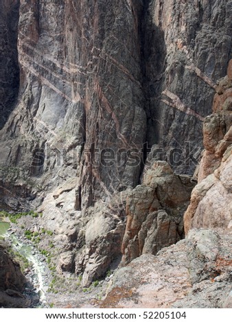 Black Canyon of the Gunnison Colorado Rugged Cliffs and River. Steep cliffs above the Gunnison River rugged rocky canyon. Scenic landscape looking down.
