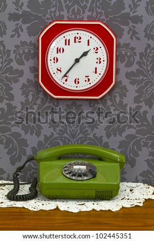 Conceptual - old fashioned telephone and clock