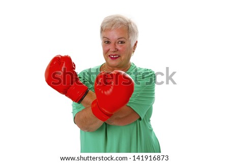 Female senior with red box gloves - isolated on white background