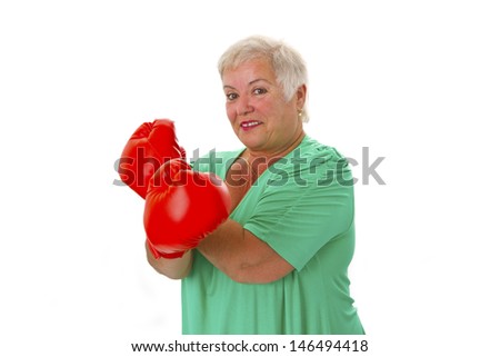 Female senior with red box gloves - isolated on white background