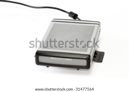 Portable hard disk in the metal case on bright background