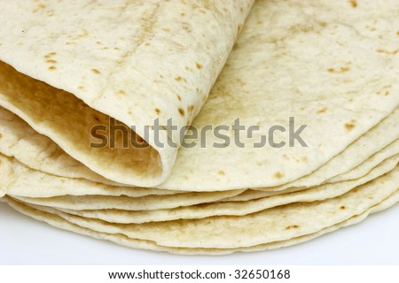 Tortilla flat bread on bright background