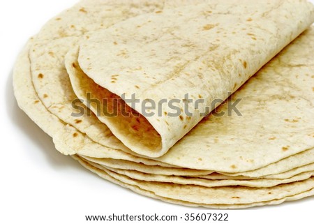 Tortilla flat bread on bright background