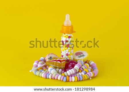 Colorful Candy on yellow background