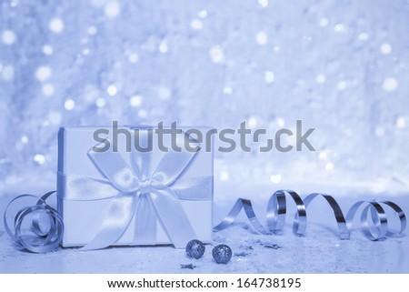 Christmas cold background with decorations and gifts