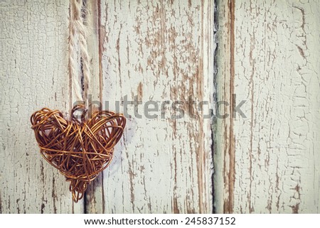 heart of a copper wire, hanging on a rope