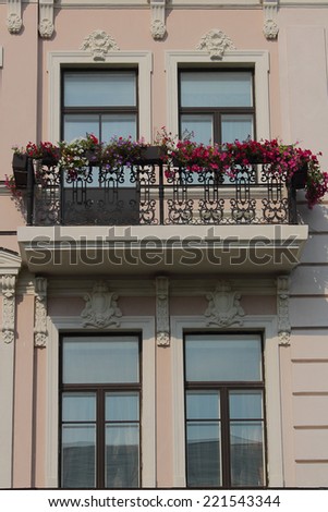old balcony decorated with flowers
