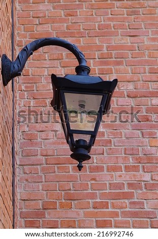 Old abandoned factory in Lodz - brick wall - lamp