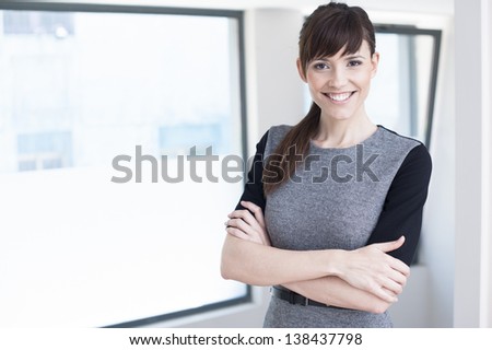 smiling business woman. Middle age beautiful and smiling business woman.
