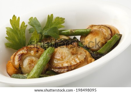 The butter fried scallops and asparagus