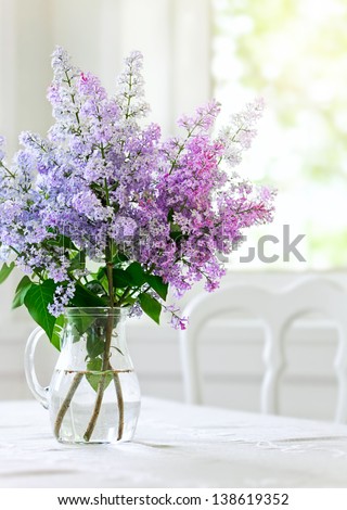 Bunch Lilac In Vase On Table