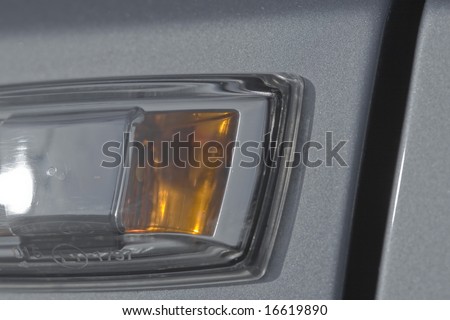 Turning signal on a car in a close up