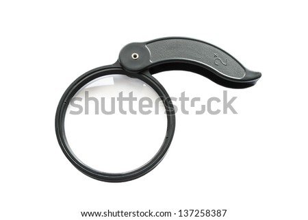 Big magnifying glass isolated over white