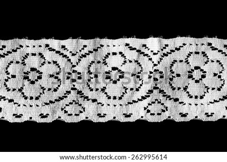 White vintage border lace isolated over black