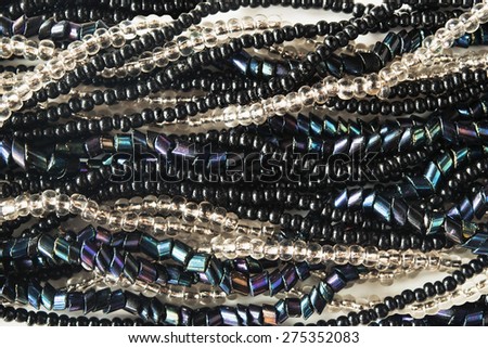 Strings of glass beads as a background
