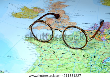 Glasses on a map of europe - Paris