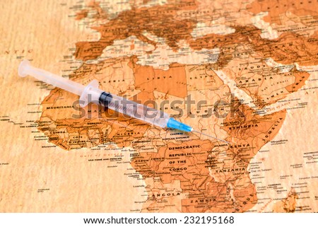 syringe on a map of africa