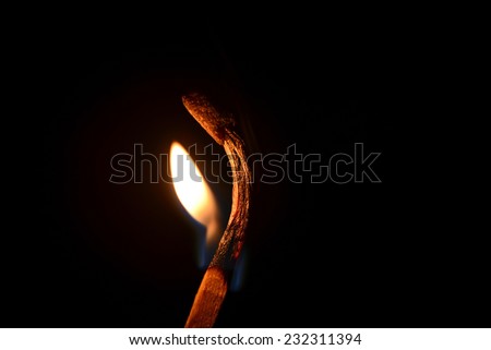 match fire isolated on black background