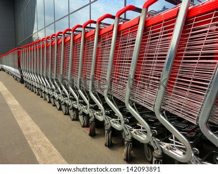 shopping carts lined up at supermarket
