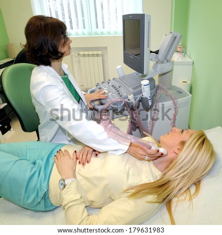 BELGRADE, SERBIA - CIRCA MARCH 2012:: Unidentified doctor shows ultra sound internal medicine exam procedure, circa March 2012  in Belgrade