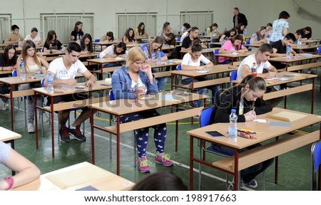 BELGRADE, SERBIA - CIRCA JUNE 2014: Adults take exam for high school, circa June 2014 in Belgrade.