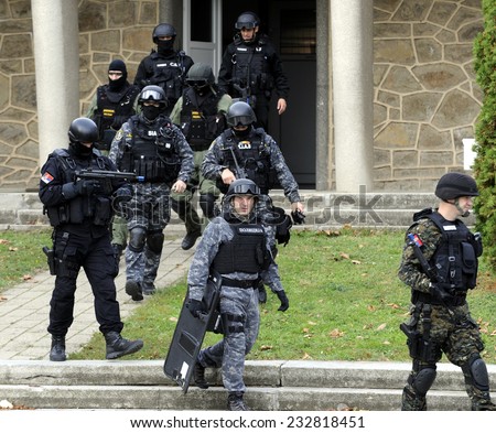 BATAJNICA, SERBIA - CIRCA NOVEMBER 2014: Special force police practices release of hostages at joined exercise, circa November 2014 in Batajnica