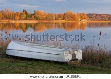 The change of seasons.  The boat is out of the water and the leaves are changing