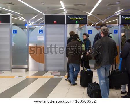 RUSSIA - MOSCOW - 31 JANUARY 2014: Sheremetyevo International Airport increases the number of canceled flights to Europe because of bad weather - people at passport check