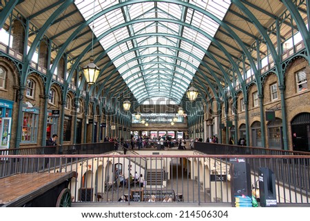 LONDON - UK -  JUNE 22, 2014: View of Covent Garden market in London. Covent Garden - one of the main tourist attractions in London - is known for its restaurants, pubs, market stalls and shops