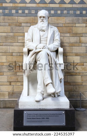 LONDON, UK - JUNE 26, 2014: The Statue of Charles Darwin in the Natural History Museum, the statue was moved into its new position at the top of the main staircase in the Central Hall in May 2008.