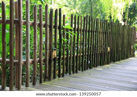 Old wooden fence in garden.