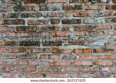 Wall with raw brick and mortar bed, wall background.