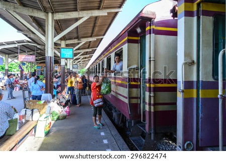 BANGKOK - July 11: Unidentified woman monger deliver vegetables by rail freight on July 11, 2015 in Bangkok, Thailand.